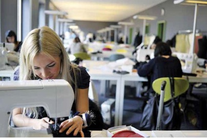 IM Fashion Design student at sewing machine
